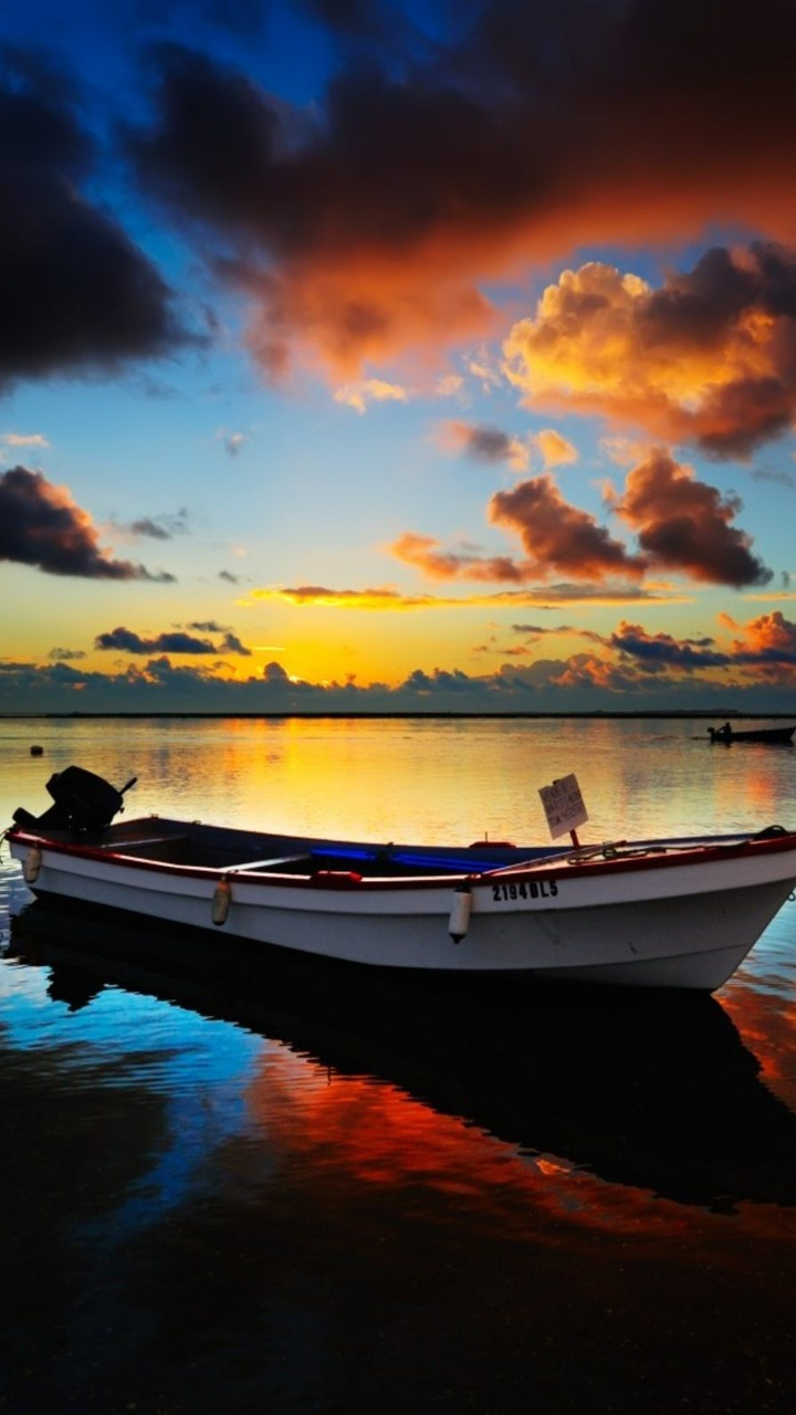 Download Sea Boat Dark Sunset, Sea, Boat, Dark, Sunset Wallpaper in  720x1280 Resolution